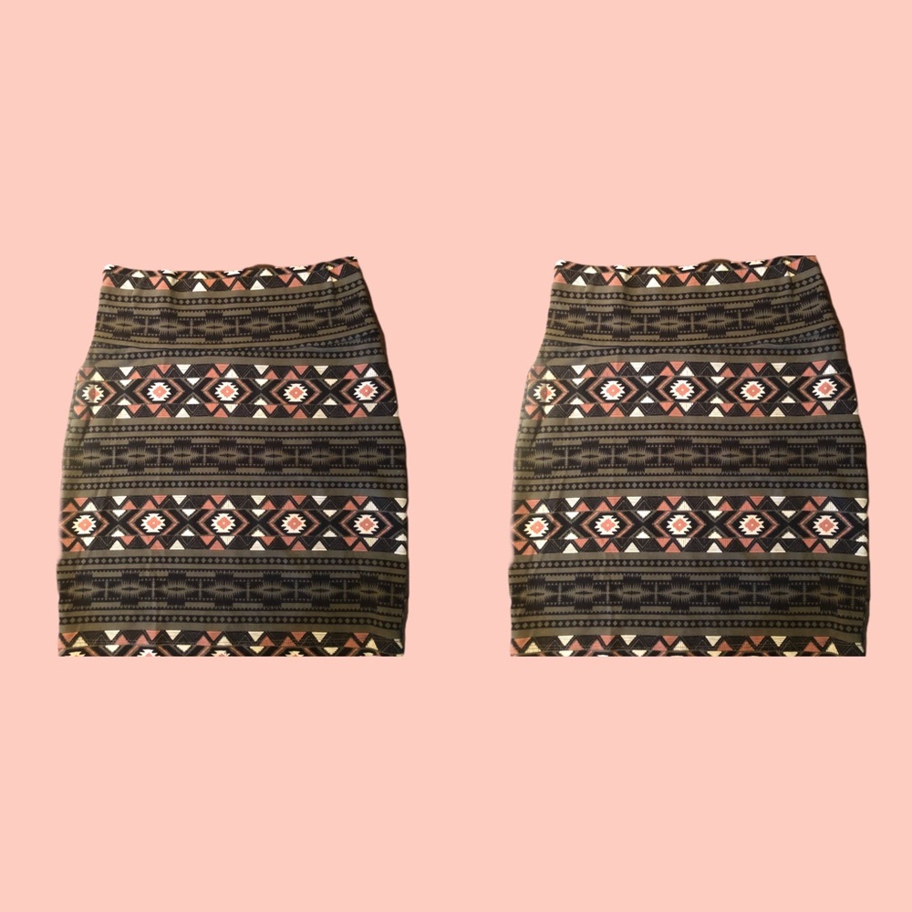 Green and black skirt with pink and white triangles along with other designs.
